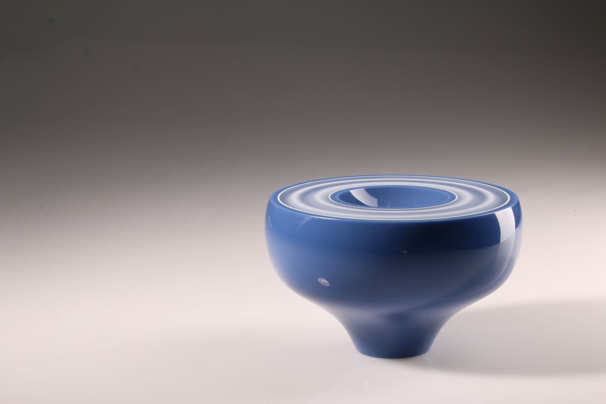Peter Bowles, Kepler 10c, side view of the blue glass sculptural vessel.