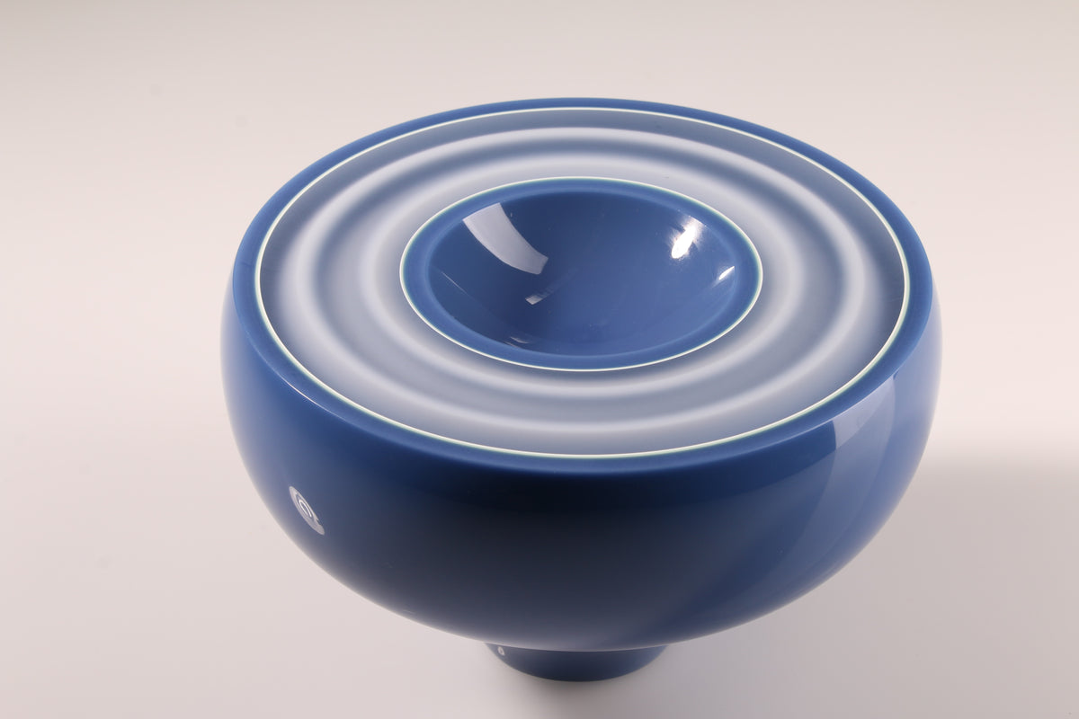 Peter Bowles, Kepler 10c, blue glass sculptural vessel viewed from above.