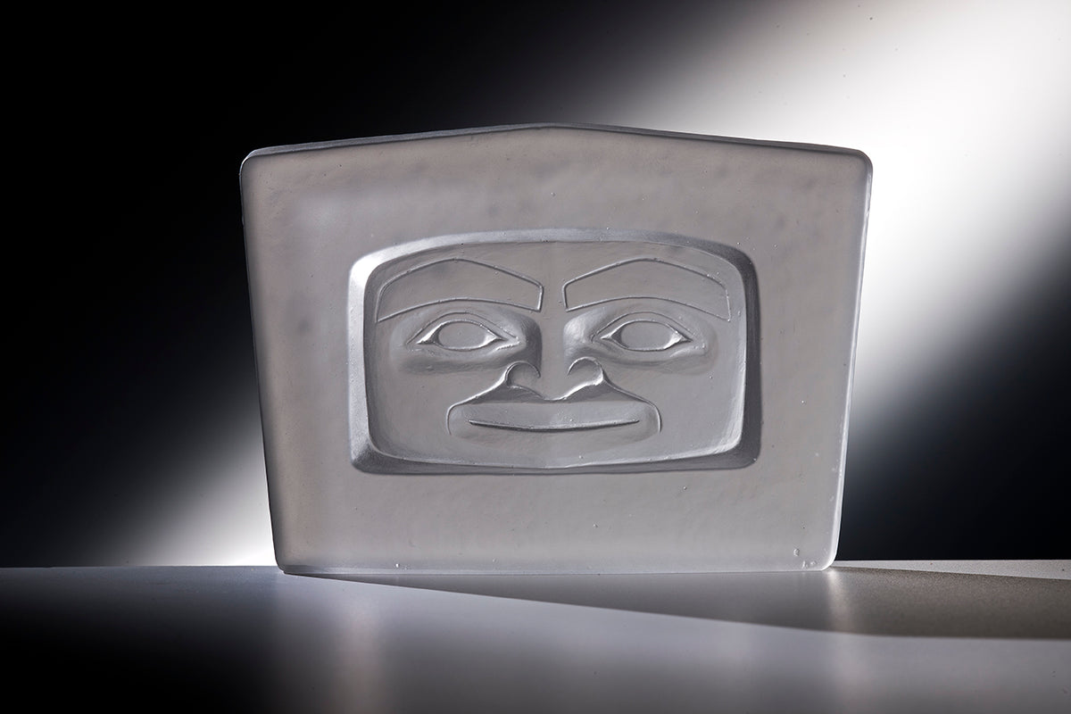 Spirit Face by Preston Singletary, frosted glass relief of a Tlingit-style face