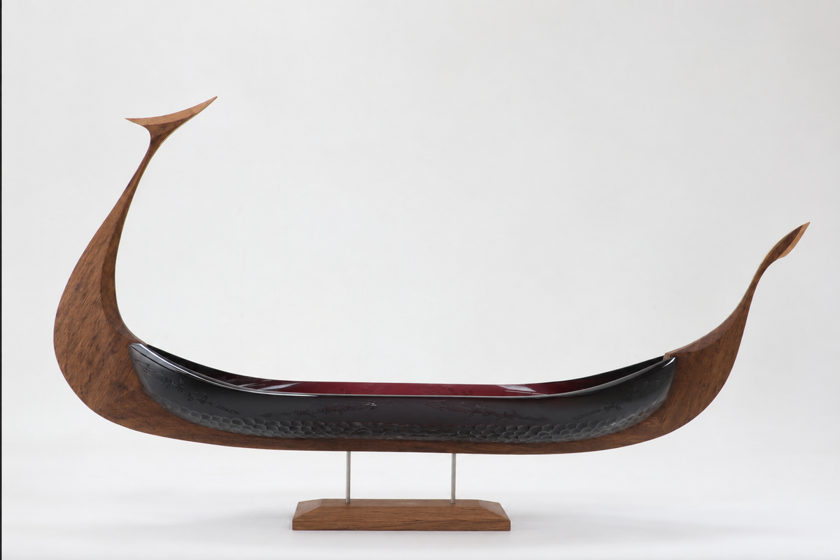 An Arrow Made of Mistletoe Glasskibe sculpture with the text removed