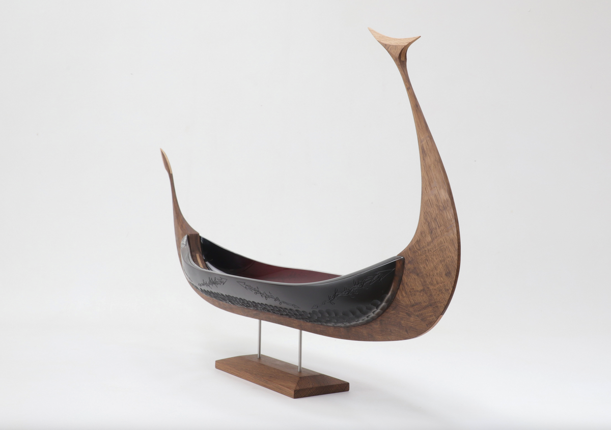 An Arrow Made of Mistletoe, glass and oak Viking ship sculpture, angled view