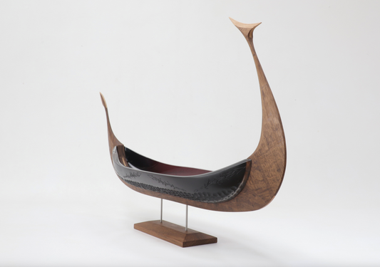 An Arrow Made of Mistletoe, glass and oak Viking ship sculpture, angled view