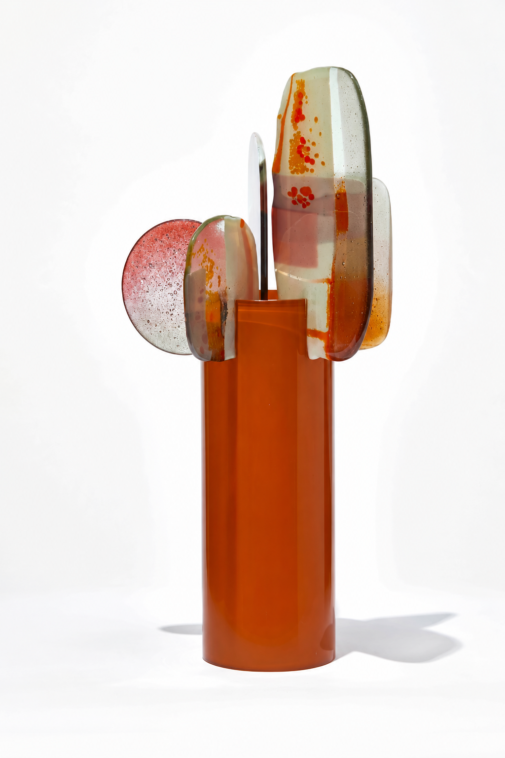 Canna by Amy Cushing, amber-orange glass sculpture with layered translucent kiln-formed finials.