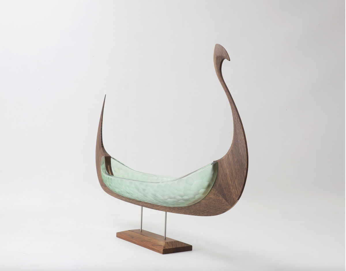 Apple (Anniversary Piece), green glass and oak Viking ship sculpture, angled view