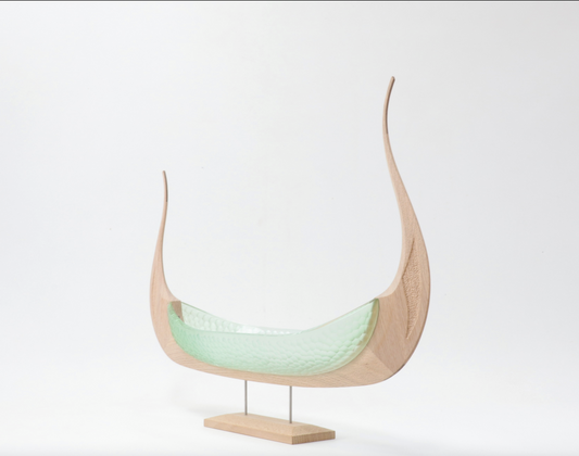 Balder, sea-green glass and light oak Viking ship sculpture, angled view